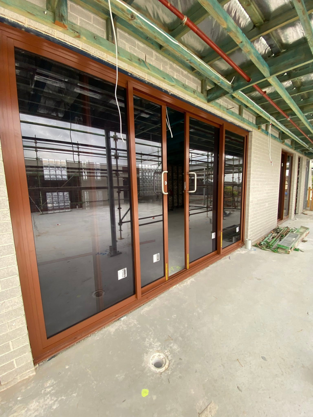 Commercial aluminium sliding door — finished