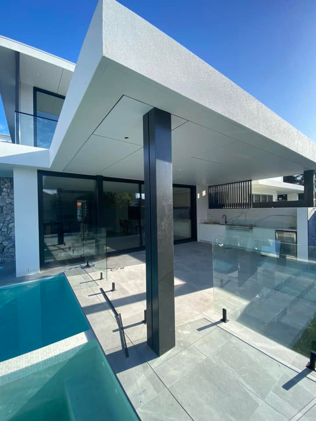 Completed home renovation — pool and outdoor kitchen