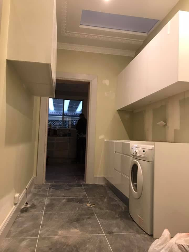 Laundry renovation — cabinetry install in progress