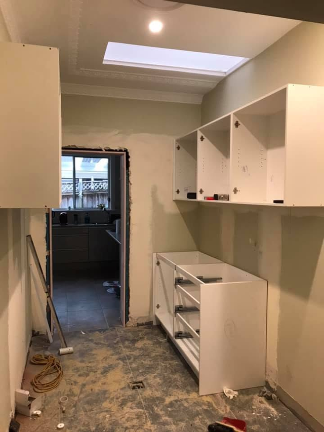 Laundry renovation — wall cabinetry install