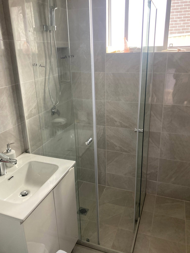 Standing shower upgrade — frameless glass