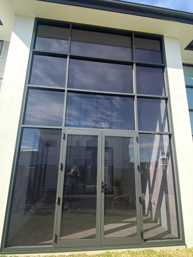 Aluminium corner windows — modern home exterior