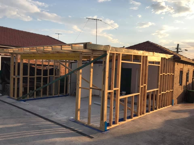 Whole-home renovation — extension framing, exterior