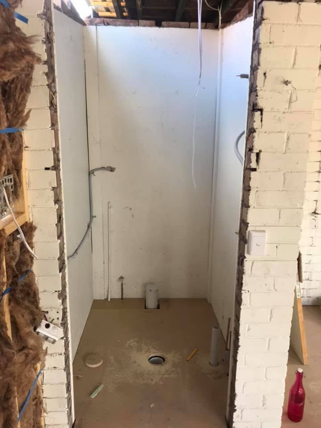Whole-home renovation — bathroom strip-out